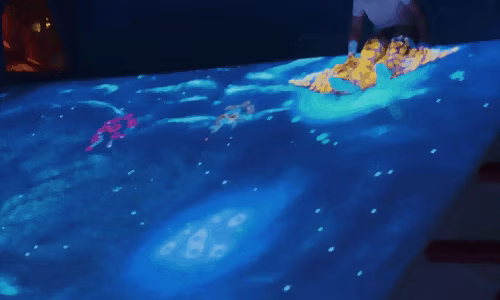 child-interacting-animated-underwater-projection